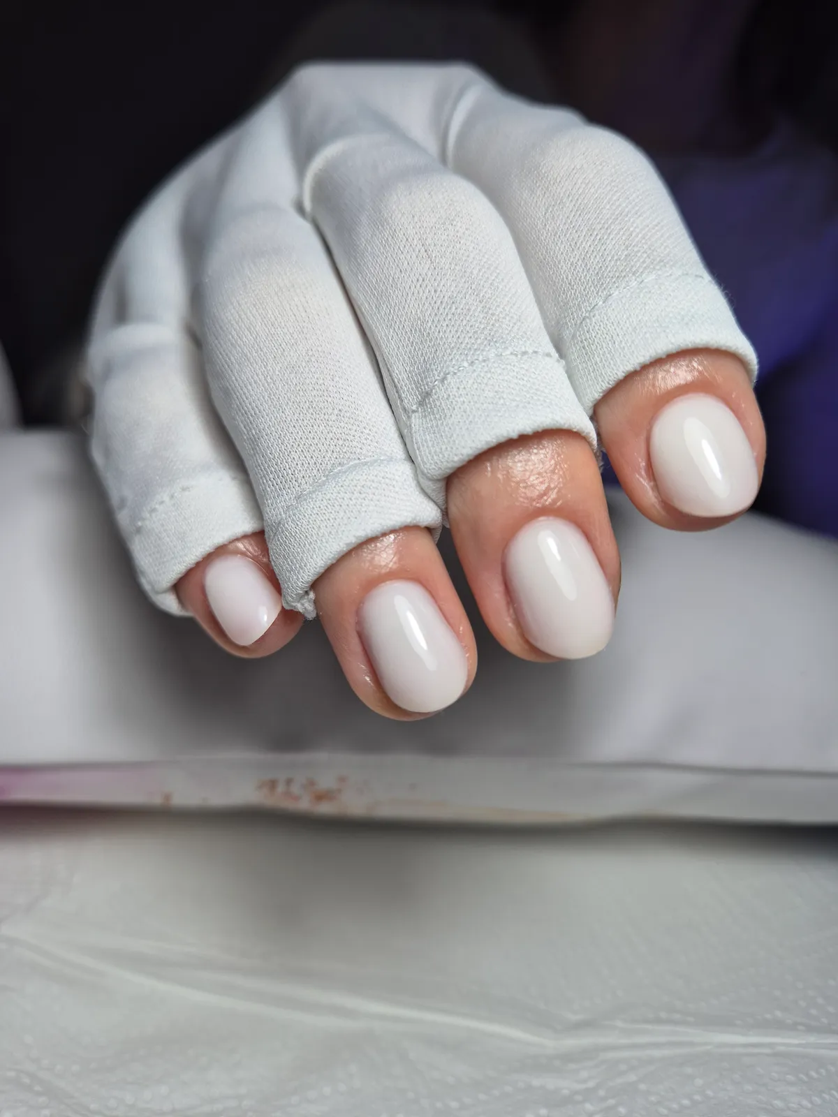 Short milky white rubber base nails
