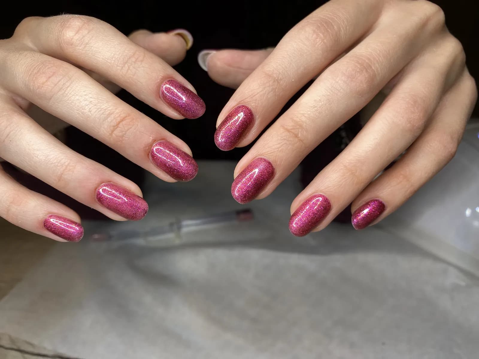 Raspberry pink glitter on short natural nails